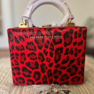 BRANDON BLACKWOOD RED LEOPARD TRUNK